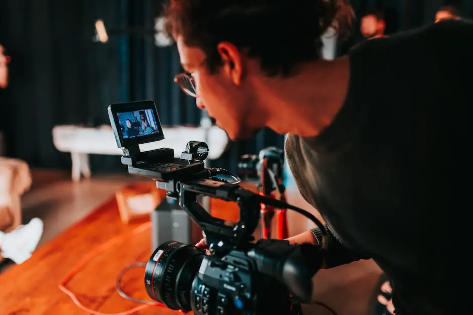 A person holding a camera recording a video in 4K resolution.