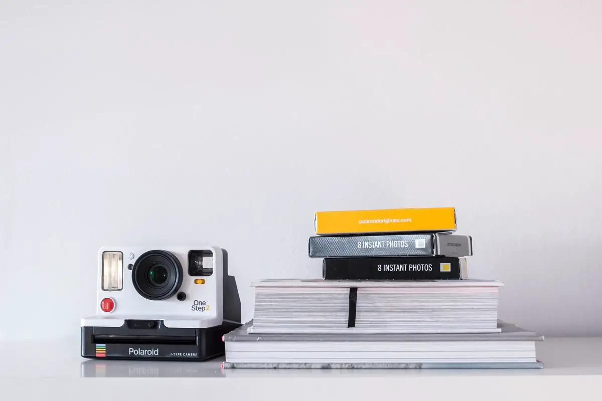 Image of a 4x5 Polaroid Back showcasing its various components and how they contribute to the photography process