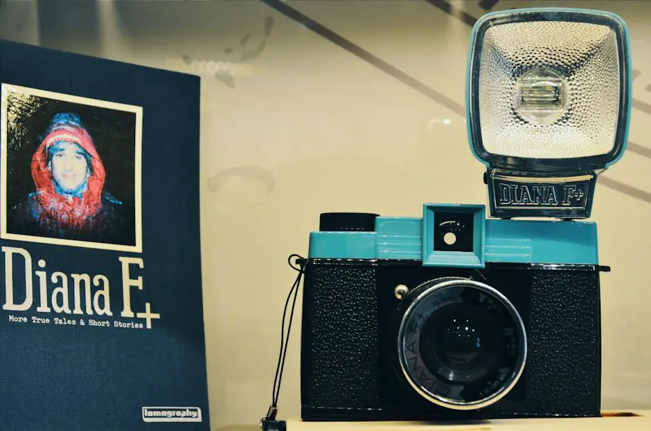 A vintage Polaroid SX 70 camera with a retro design and a folding capability.