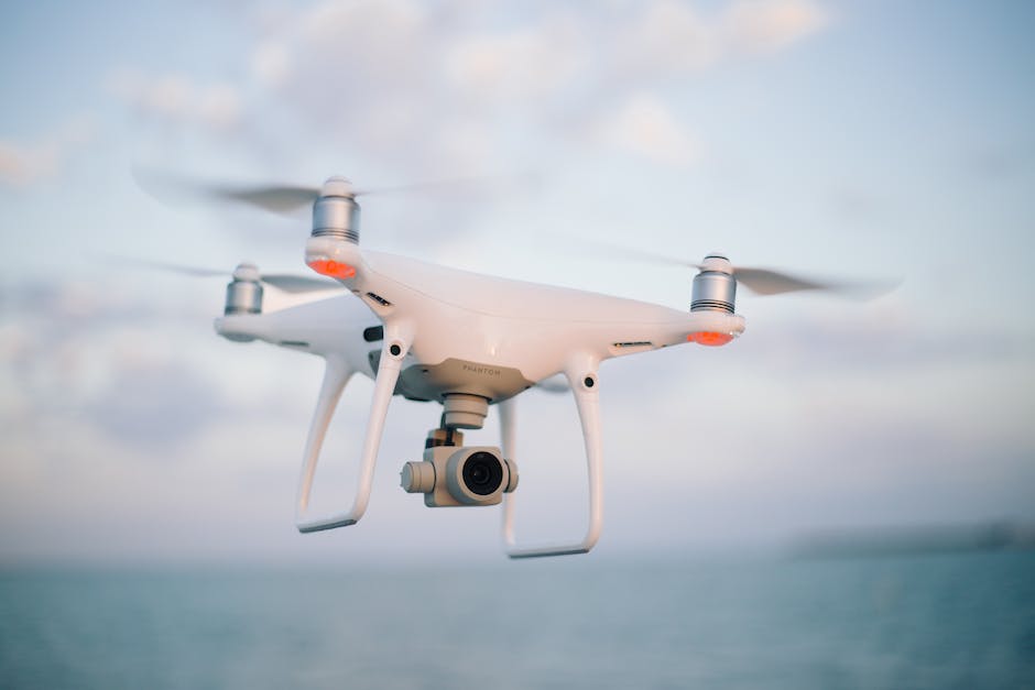 Aerial view of a DJI Phantom series drone flying in the sky