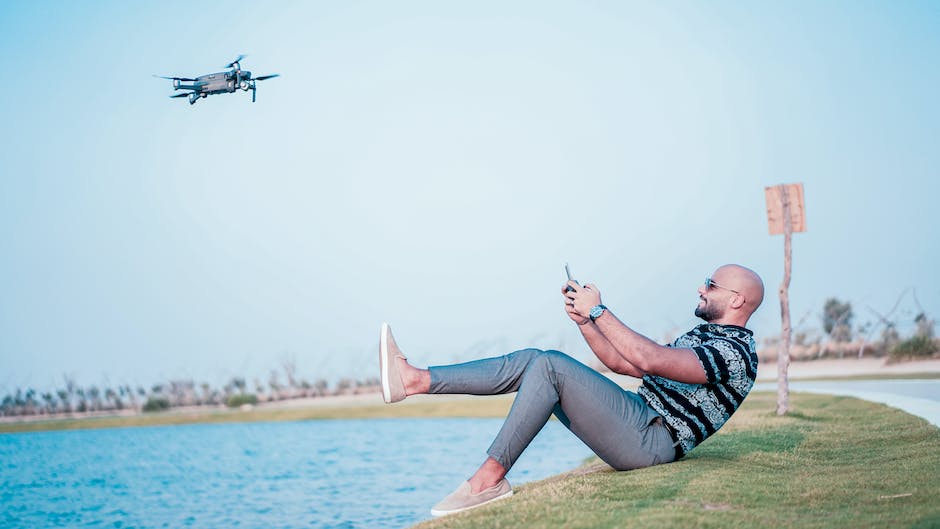 Image depicting a drone pilot operating a drone in compliance with FAA regulations