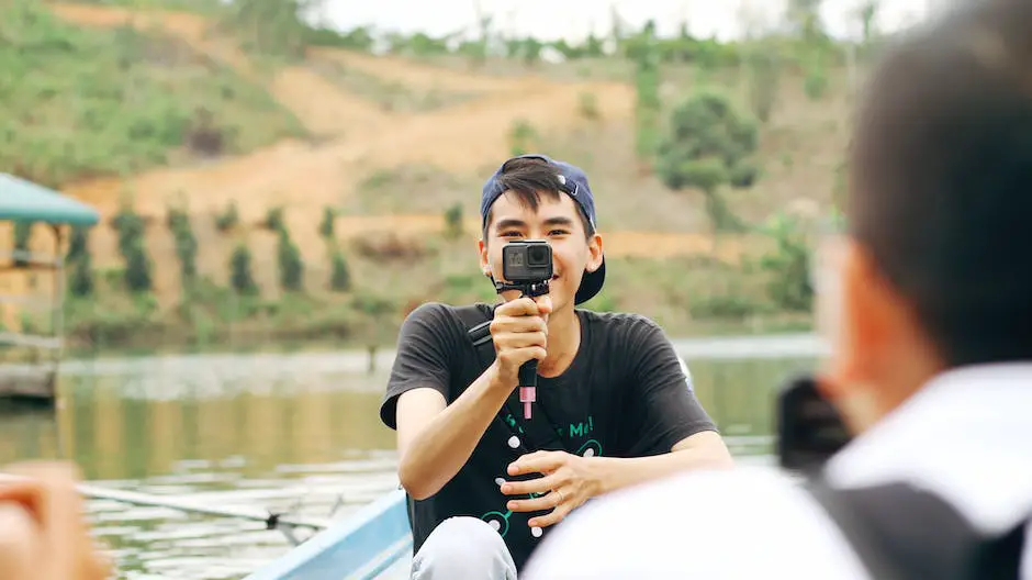 A person holding a GoPro camera, planning their content for live streaming