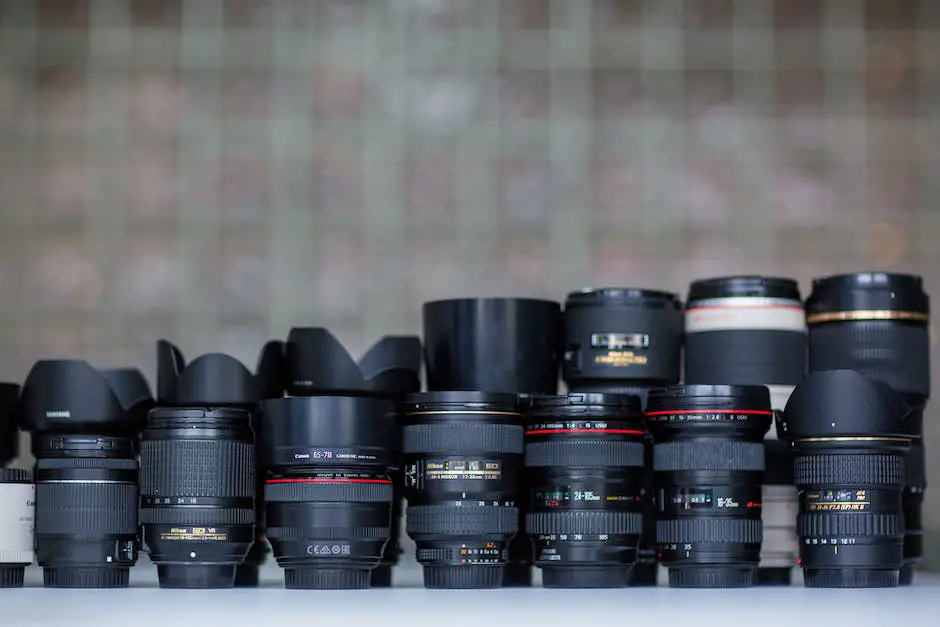 A collection of macro lenses with varying focal lengths and brands, laying side by side on a white background.