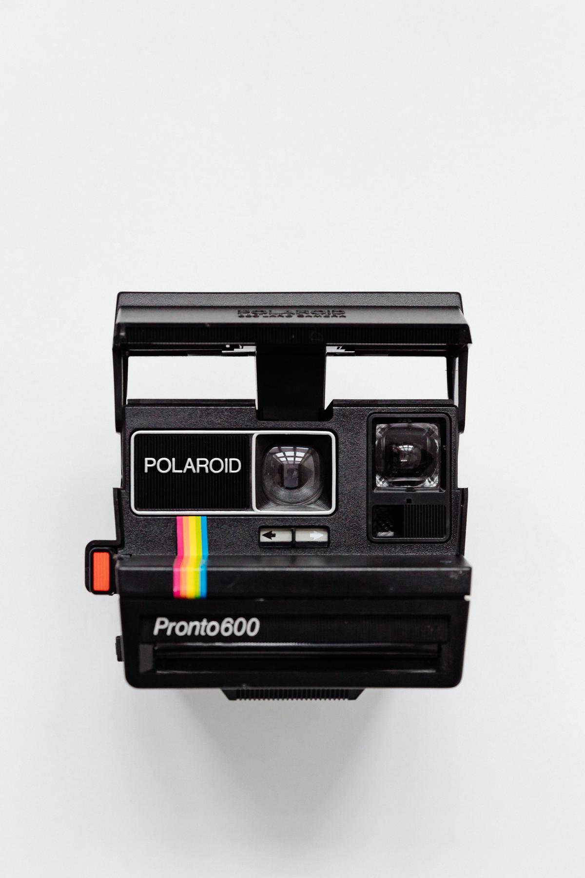 Image of a vintage Polaroid camera with its unique design and retro appeal.